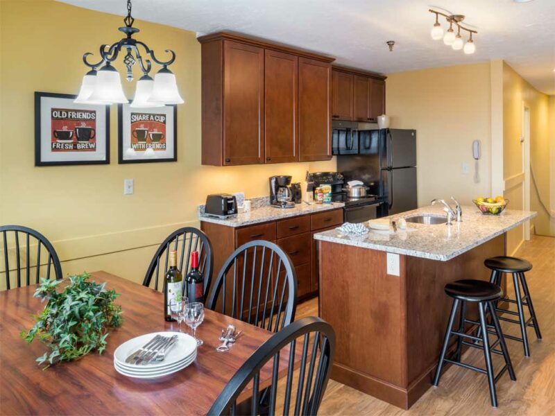 Enjoy the Signature Suites open concept kitchen with granite counters and new appliances